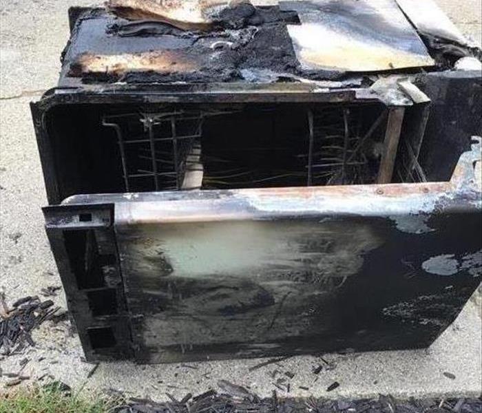 a dishwasher burned and destroyed by fire 